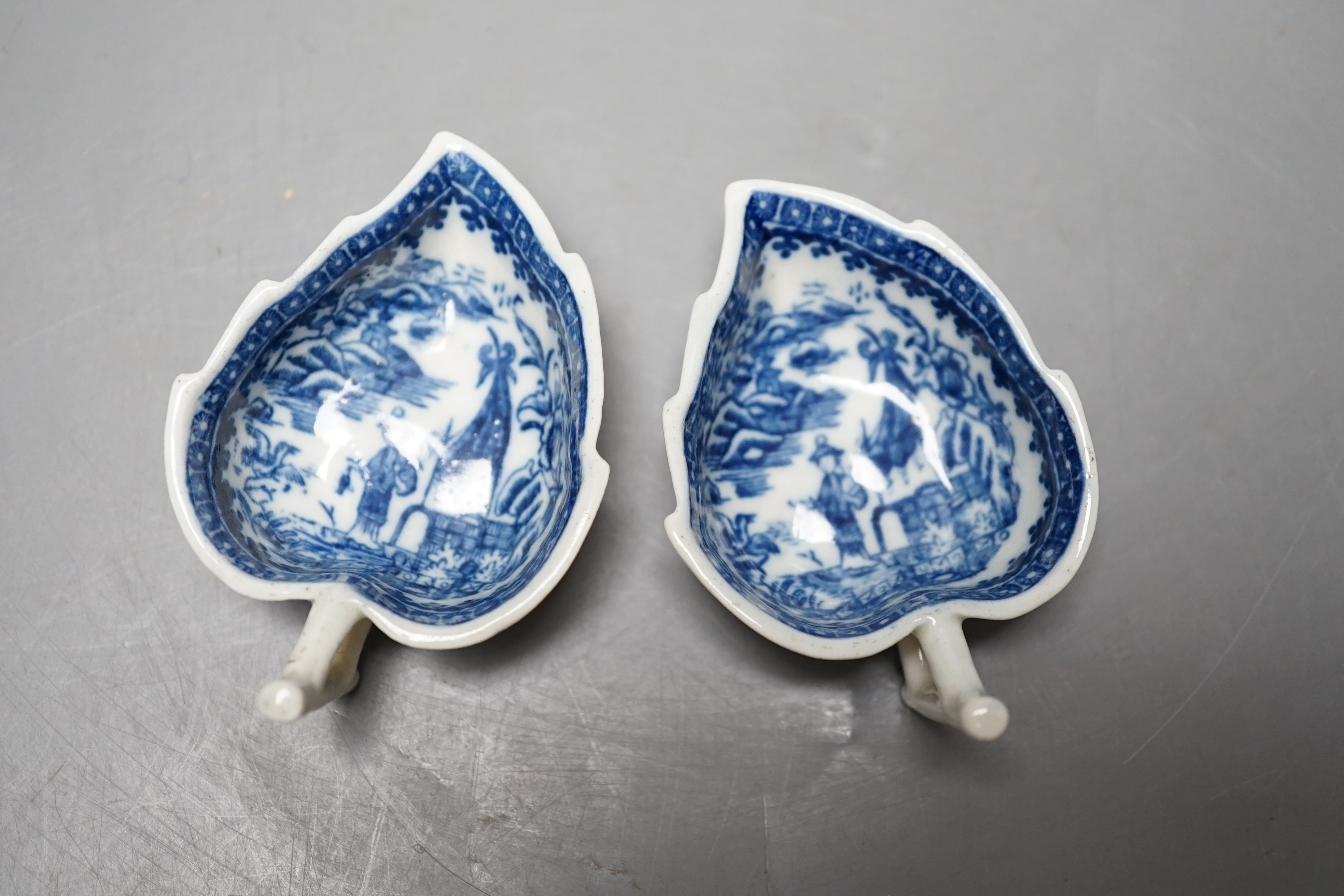 Two Caughley fisherman pattern blue and white pickle leaf dishes, c.1780, one with S mark, 7.5 cm long